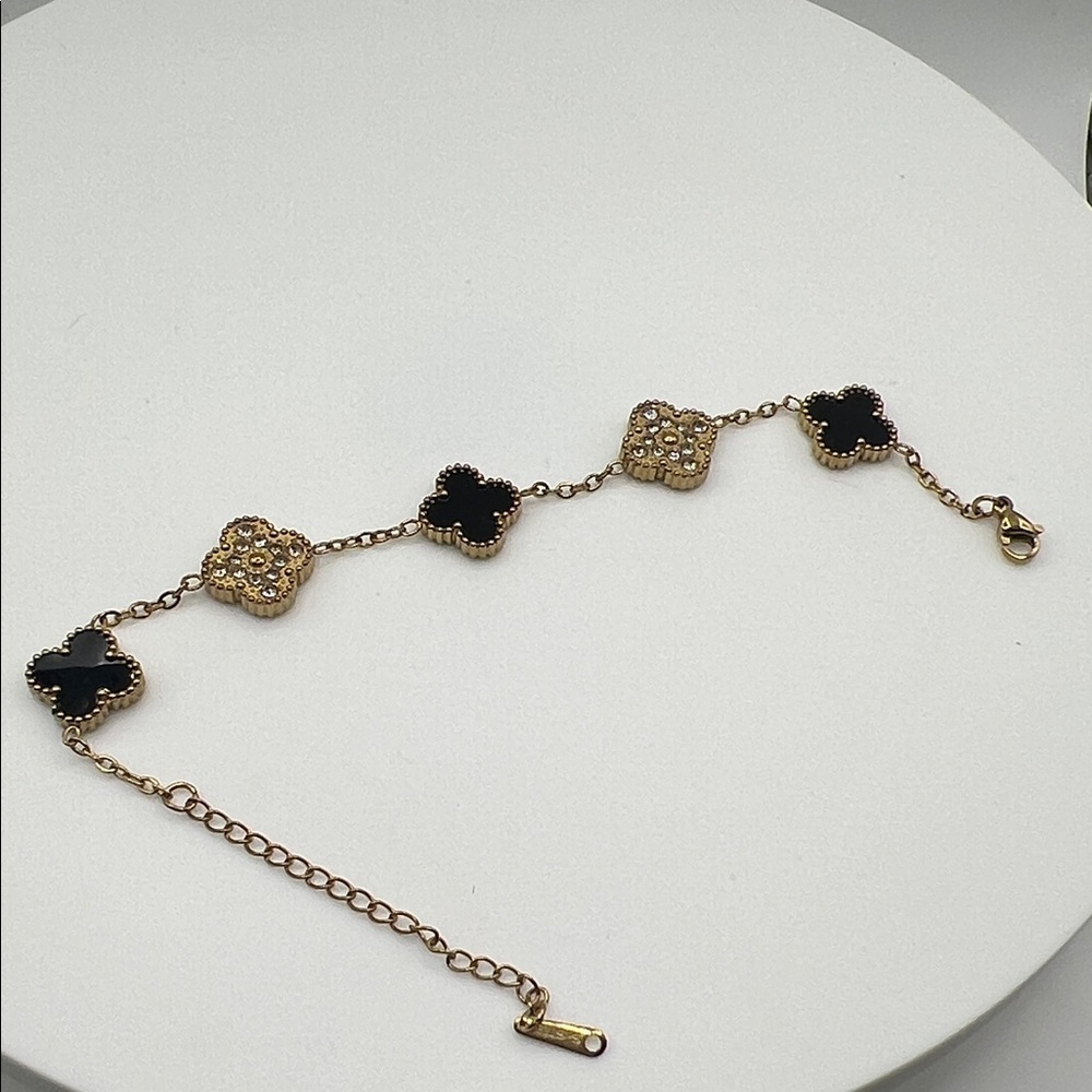 243. Elegant Gold and Black Bracelet